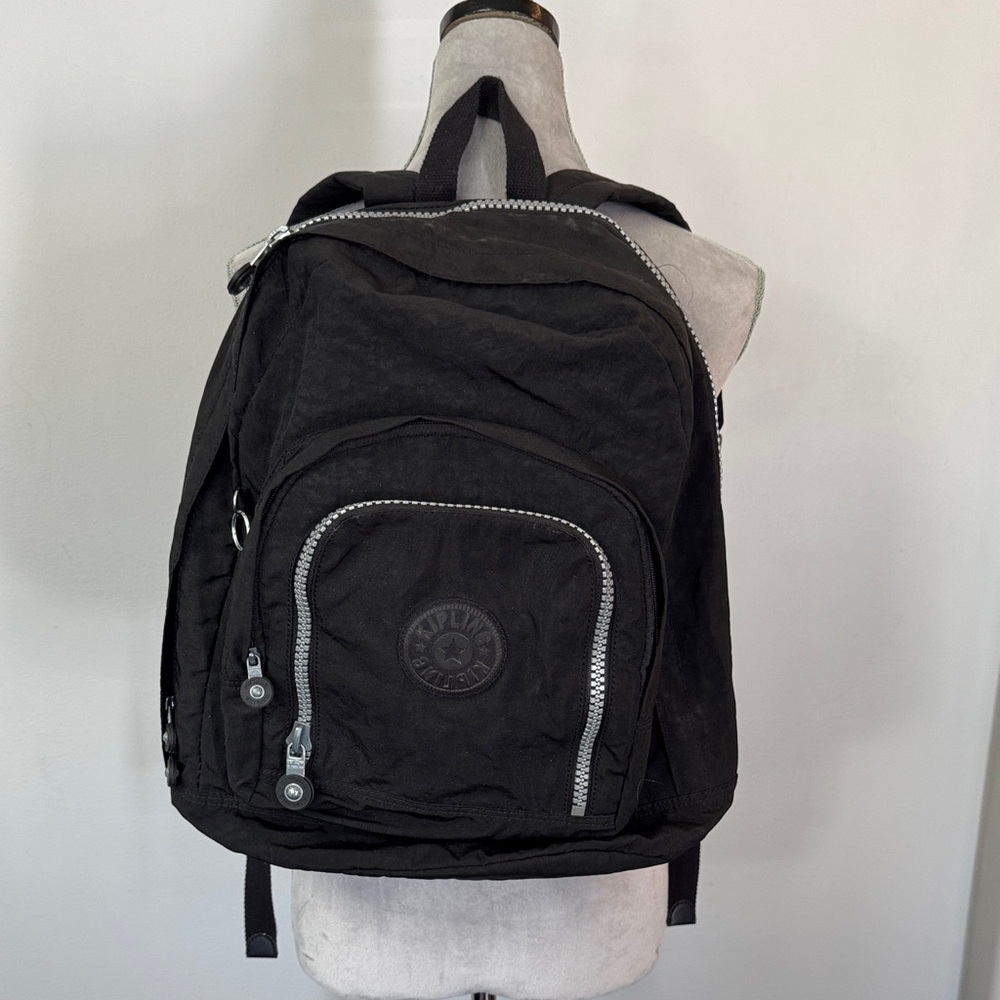 Kipling Hal Expandable Black Backpack with large Silver Accent zippers EUC